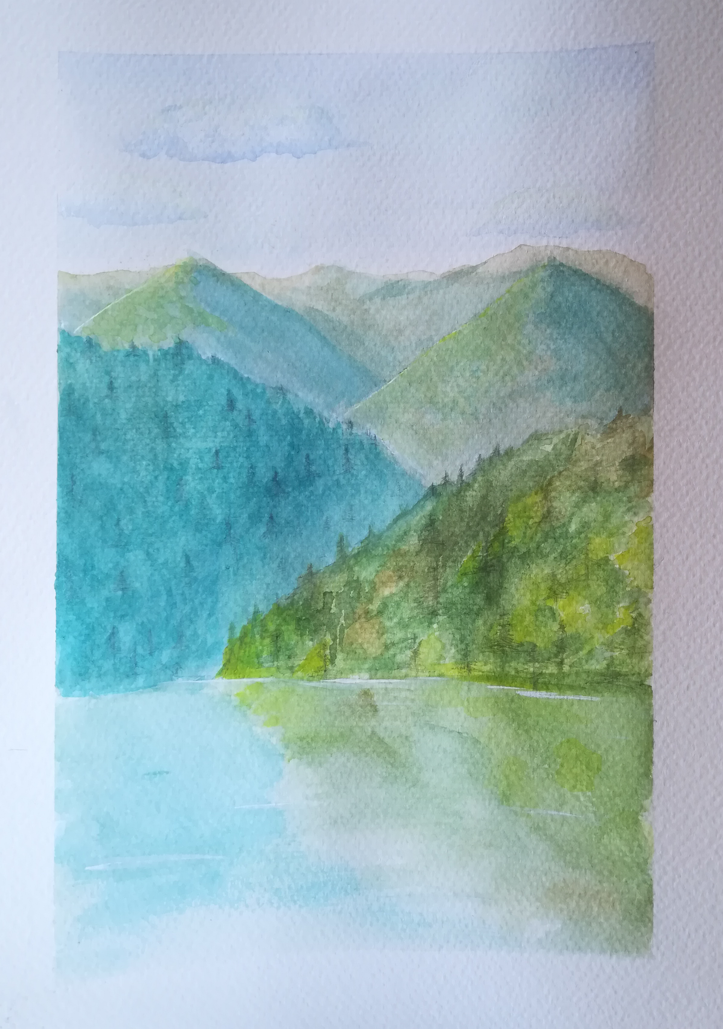 two v shaped hills, 1 in front of the other, rise above a lake. cool greens and blues
